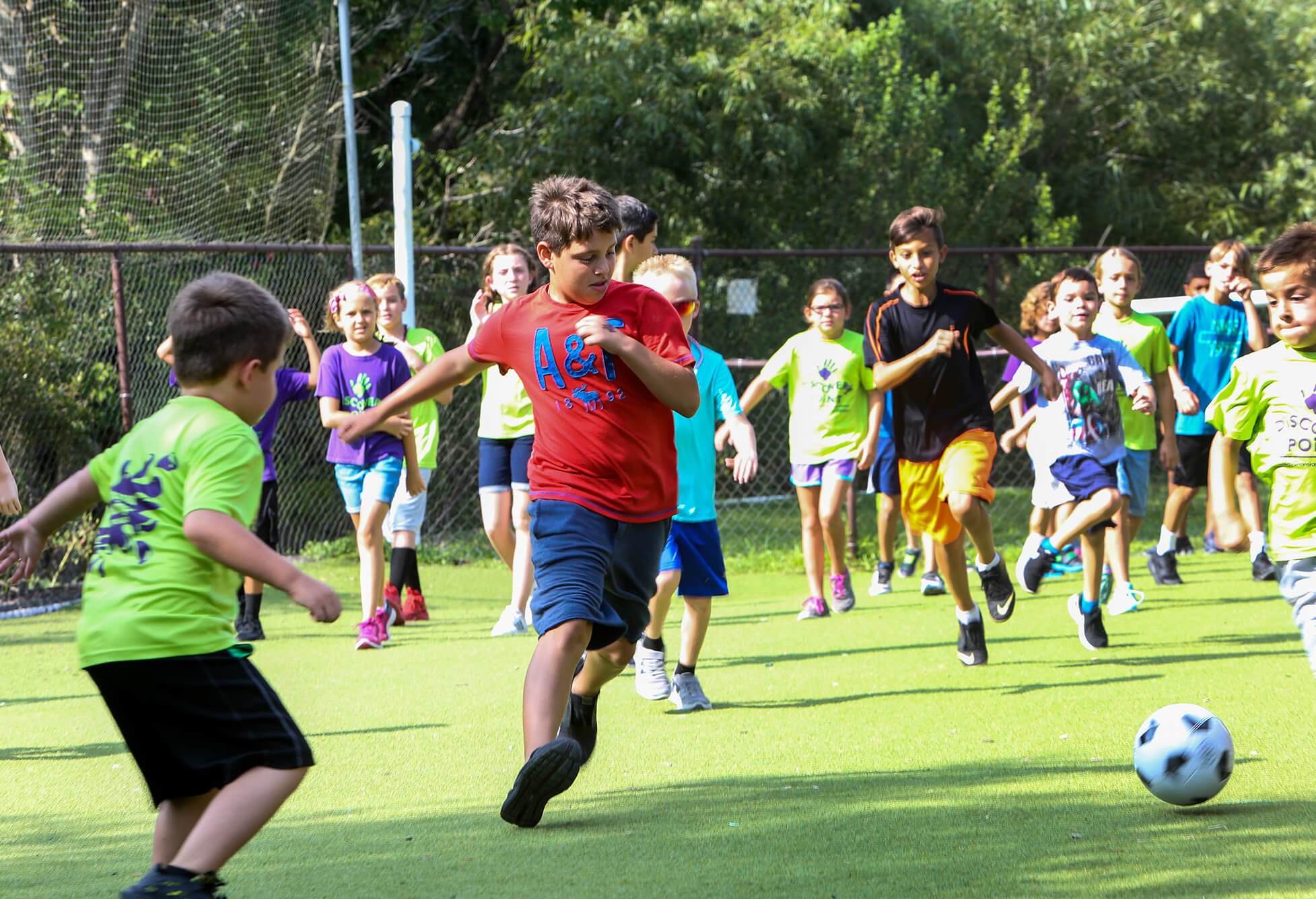 Kids playing soccer during after school program in Brooksville