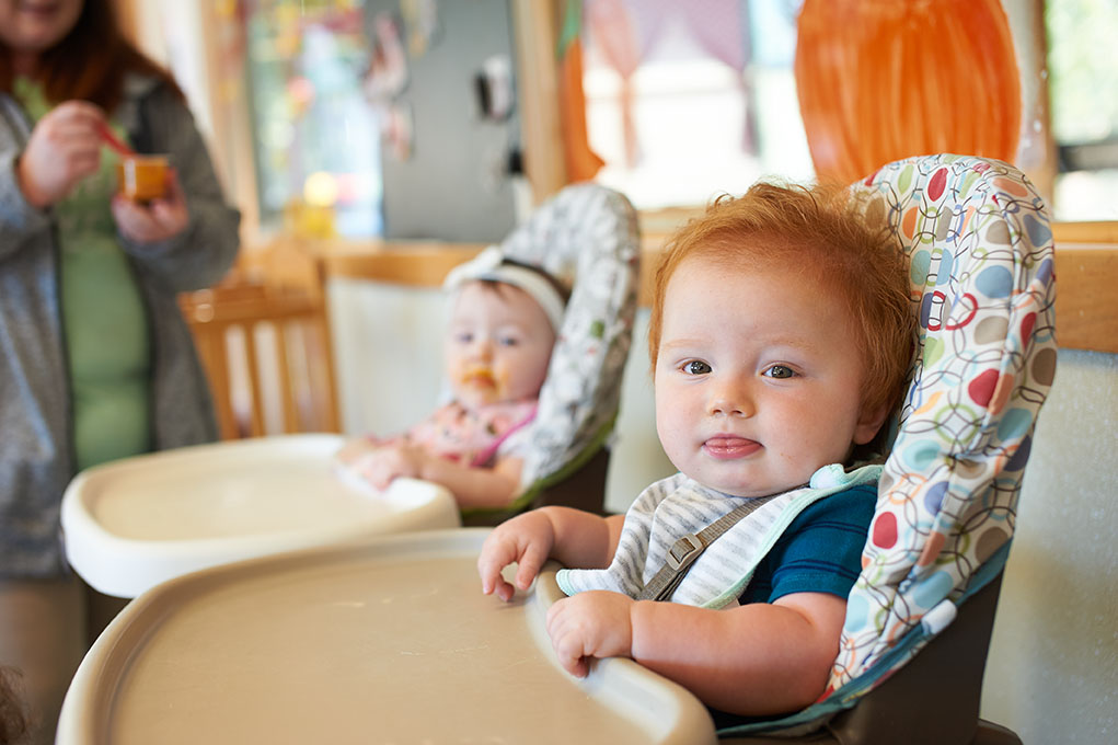 Two young children being fed at our Day Care Center in Odessa